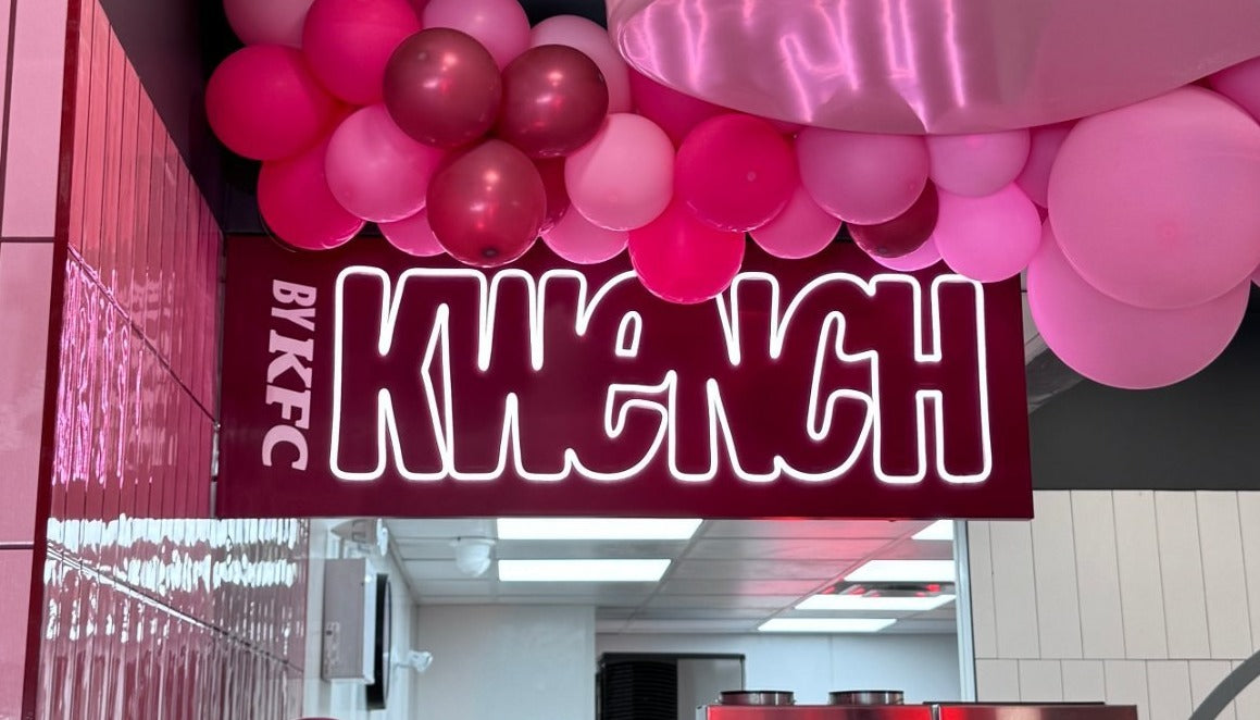 Kwench by KFC neon sign lit up inside the store — NEON YYC Calgary