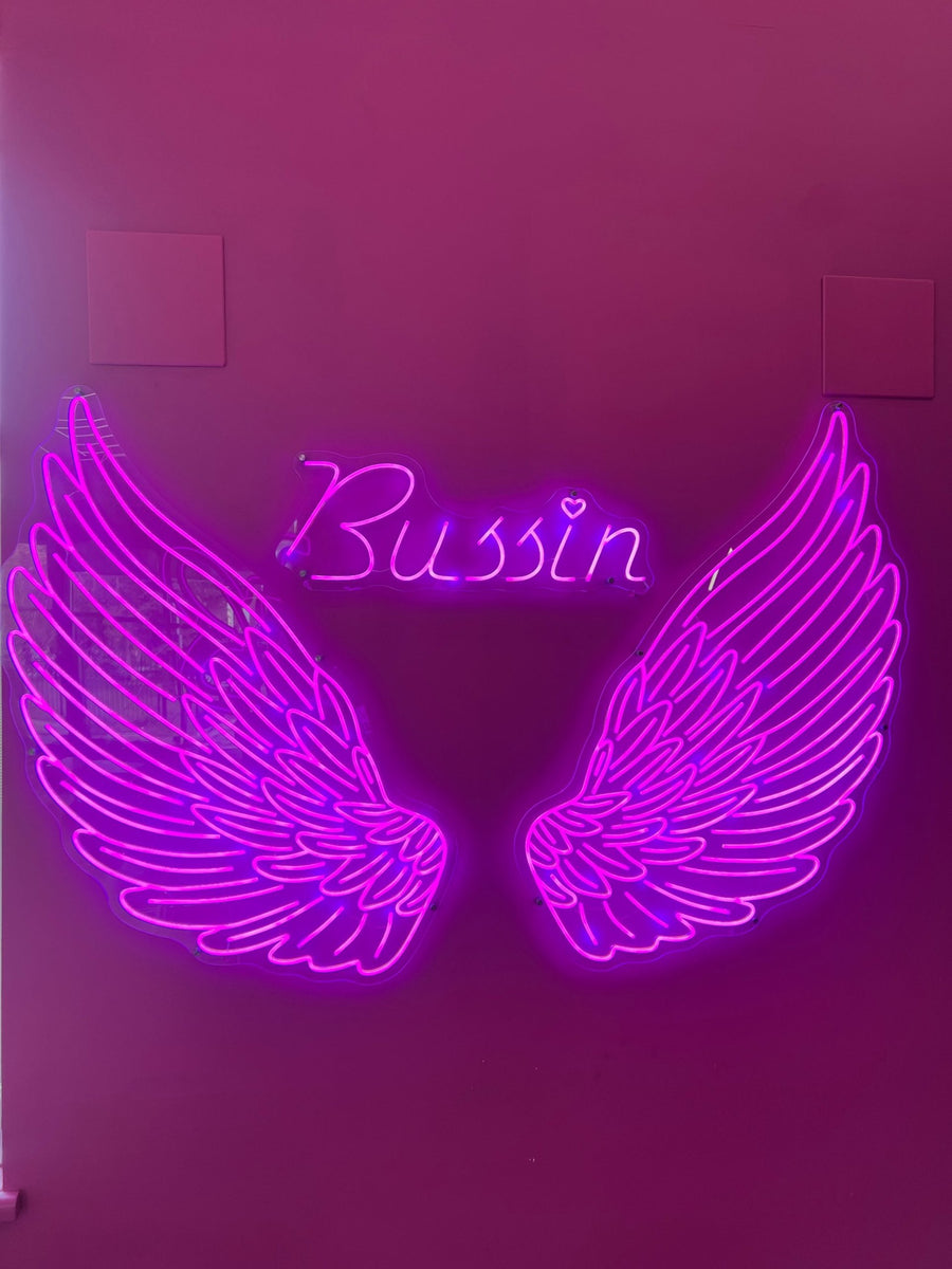 Bussin angel wings neon wall — custom neon signs Calgary by NEON YYC