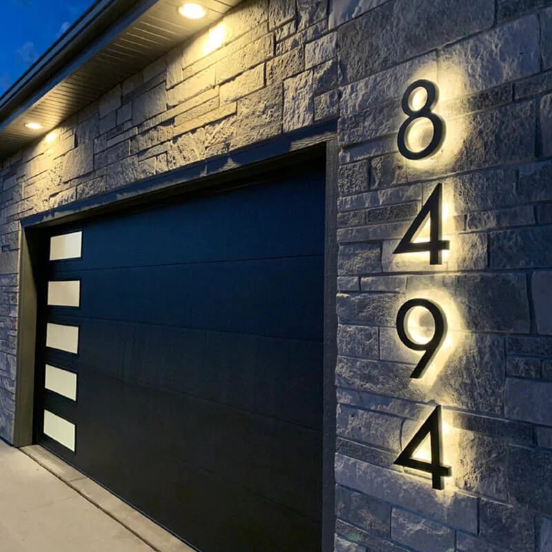 Halo-lit outdoor house numbers on stone — backlit signs Calgary