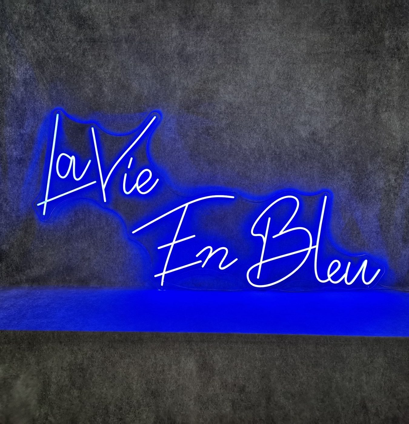 La Vie En Bleu custom blue neon sign — personal custom neon signs Calgary