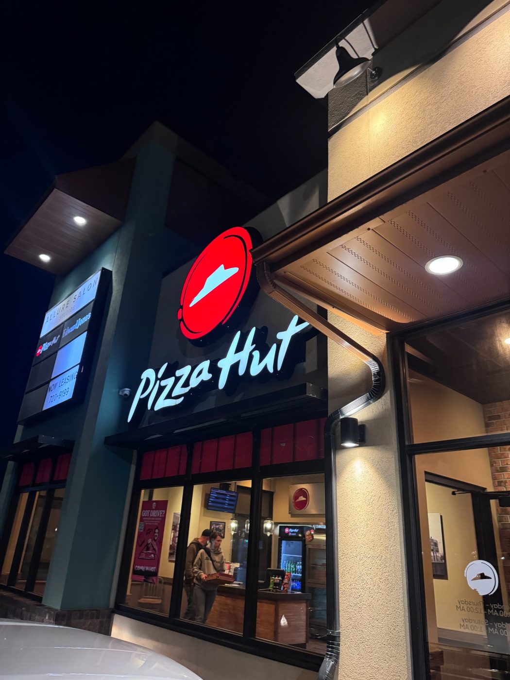 Pizza Hut illuminated channel letter storefront — commercial signs Calgary
