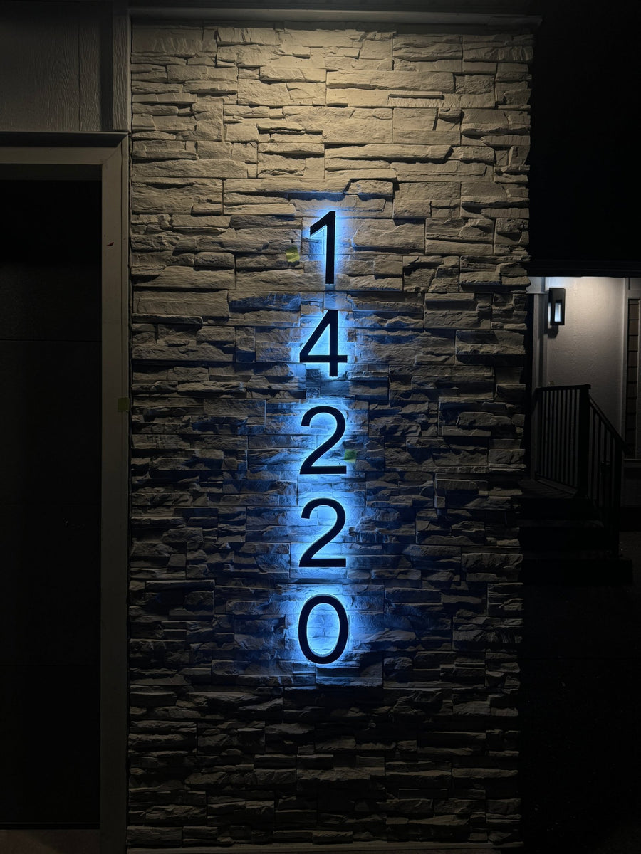 Backlit house numbers lit at night — backlit signs Calgary by NEON YYC