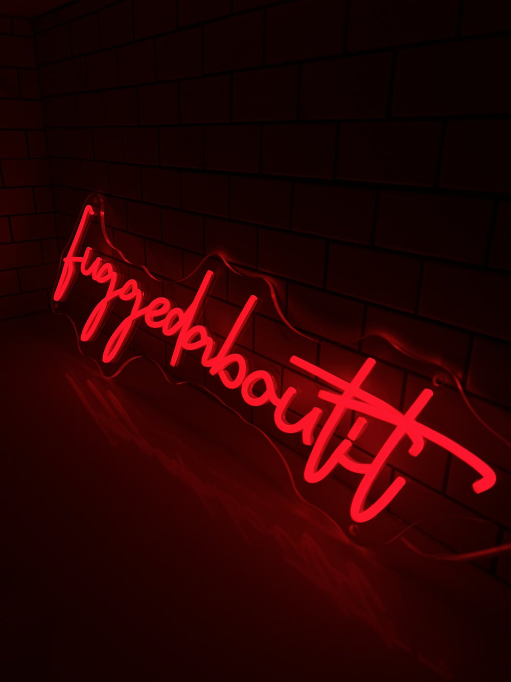 Fuggedaboutit red script LED neon sign — NEON YYC Calgary