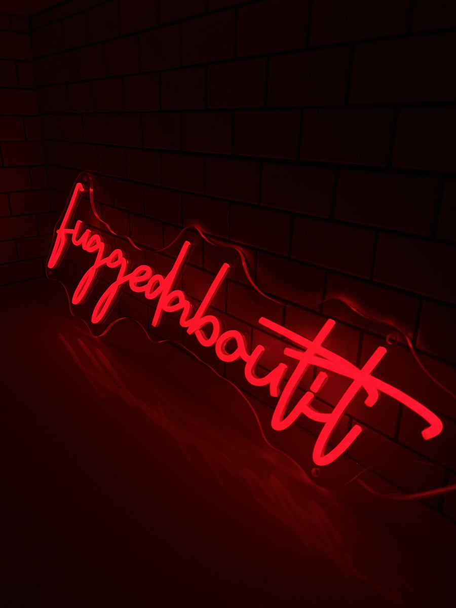 Fuggedaboutit red script neon — custom neon signs Calgary by NEON YYC