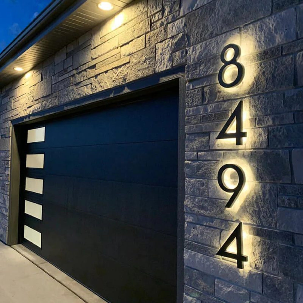 Halo-lit outdoor house numbers on stone — backlit signs Calgary