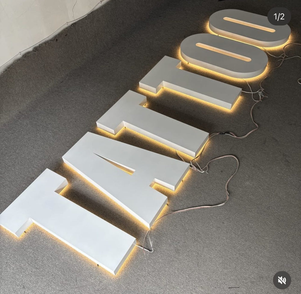 Tattoo studio halo-lit backlit letters — NEON YYC Calgary